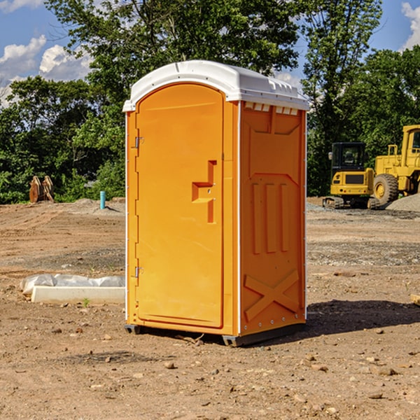 what is the cost difference between standard and deluxe portable restroom rentals in New Athens